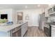 A chef's kitchen featuring granite countertops, stainless steel appliances, and a view to other rooms at 1398 Nokota Dr., Conway, SC 29526