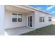 Covered patio with multiple windows and a sliding glass door, providing a seamless indoor-outdoor transition at 1398 Nokota Dr., Conway, SC 29526
