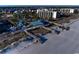Aerial view of the oceanfront property with clubhouse, beach access, and nearby condominium buildings at 14290 Ocean Hwy. # 312, Pawleys Island, SC 29585