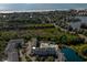Aerial view displaying property pool, landscaping, and proximity to the ocean at 14290 Ocean Hwy. # 312, Pawleys Island, SC 29585