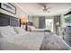 Bright bedroom with two full beds, soft linens, a ceiling fan, and dresser at 14290 Ocean Hwy. # 312, Pawleys Island, SC 29585