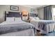 Comfortable bedroom featuring two full beds with soft white linens and tasteful décor at 14290 Ocean Hwy. # 312, Pawleys Island, SC 29585