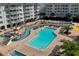 Community pool featuring a splash pad, chairs and tables at 14290 Ocean Hwy. # 312, Pawleys Island, SC 29585