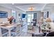 Bright and airy living room featuring modern decor, comfortable seating, and lots of natural light at 14290 Ocean Hwy. # 312, Pawleys Island, SC 29585