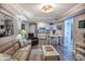 Inviting living room with a view into the kitchen, offering a relaxed and comfortable atmosphere at 14290 Ocean Hwy. # 312, Pawleys Island, SC 29585
