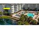 Beautiful pool area with multiple levels, seating, and lush landscaping at this condominium complex at 14290 Ocean Hwy. # 312, Pawleys Island, SC 29585