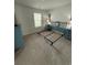 Bright bedroom with light-colored walls, blue furniture and carpeted floor at 1565 Jardine Loop, Little River, SC 29566