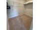 Empty carpeted walk-in closet with wire shelving, offering ample storage space at 1565 Jardine Loop, Little River, SC 29566