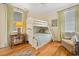 Charming bedroom featuring bunkbeds, wood floors, and a ceiling fan; perfect for or guests at 172 Colony Point Dr., Georgetown, SC 29440