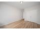Bright bedroom with wood floors, white walls, and a double closet at 178 Six Mile Creek Dr., Georgetown, SC 29440