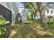 Backyard featuring a mature shade tree and lawn at 18 Coastal Breeze Trail, Pawleys Island, SC 29585