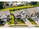 Aerial view of a two-story home with a spacious backyard and well-maintained landscaping at 1808 Zodiac Court, Myrtle Beach, SC 29577