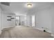 Spacious bonus room with neutral carpeting, ample lighting, and versatile layout at 1808 Zodiac Court, Myrtle Beach, SC 29577