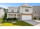 Beautiful two-story home with a two-car garage and a well-manicured lawn at 1808 Zodiac Court, Myrtle Beach, SC 29577