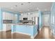 Bright kitchen with white cabinetry, stainless steel appliances, and an adjacent dining area at 1808 Zodiac Court, Myrtle Beach, SC 29577