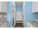 Well-appointed mudroom area with coat hooks, storage bench, and easy access to laundry at 1808 Zodiac Court, Myrtle Beach, SC 29577