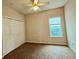 Comfortable bedroom with a closet, neutral walls and plenty of natural light from the window at 185 Lander Dr., Conway, SC 29526