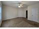 This spacious bedroom with ceiling fan and plenty of room for a full bedroom set at 185 Lander Dr., Conway, SC 29526