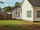 A well-maintained house with a brick foundation, large windows, and a fenced backyard at 185 Lander Dr., Conway, SC 29526