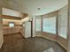 Bright kitchen with white appliances, tile floor, ample natural light at 185 Lander Dr., Conway, SC 29526