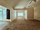 Open-concept living room with high ceilings, lots of natural light and decorative columns at 185 Lander Dr., Conway, SC 29526