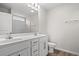Well-lit bathroom featuring double sinks, a large mirror, and a shower-tub combination at 192 Six Mile Creek Dr., Georgetown, SC 29440