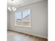 A dining room provides space for entertaining beneath a decorative light fixture at 192 Six Mile Creek Dr., Georgetown, SC 29440