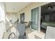 Outdoor balcony featuring comfortable seating and a sliding glass door leading into the bedroom at 200 53Rd Ave. N # 511, North Myrtle Beach, SC 29582