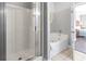 Bathroom features a shower, tub, and access to the bedroom for added convenience at 200 53Rd Ave. N # 511, North Myrtle Beach, SC 29582