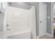 Clean white bathroom with a shower/tub, fresh towels and access to the bedroom at 200 53Rd Ave. N # 511, North Myrtle Beach, SC 29582