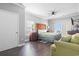Bedroom featuring a large bed, wood furniture, ceiling fan, and access to a private balcony at 200 53Rd Ave. N # 511, North Myrtle Beach, SC 29582