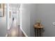 Hallway features hardwood floors, neutral walls, and tasteful decor at 200 53Rd Ave. N # 511, North Myrtle Beach, SC 29582