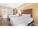 Bedroom featuring two beds, wood-style floors, and closet at 2000 Ocean Blvd. N # Ph11, Myrtle Beach, SC 29577