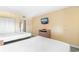 Bedroom featuring two beds, wood-style floors, and storage at 2000 Ocean Blvd. N # Ph11, Myrtle Beach, SC 29577
