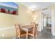 Dining area featuring a wood table with ocean view tv at 2000 Ocean Blvd. N # Ph11, Myrtle Beach, SC 29577