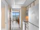 Well-lit kitchen leading to a balcony with ocean views, complete with modern appliances for convenient cooking and dining at 2000 Ocean Blvd. N # Ph11, Myrtle Beach, SC 29577