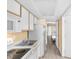 Practical kitchen with essential appliances and ample storage space, conveniently located near the bedroom area for easy living at 2000 Ocean Blvd. N # Ph11, Myrtle Beach, SC 29577