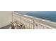 Relaxing balcony area overlooking the beach and beautiful ocean view with lounge chairs at 2000 Ocean Blvd. N # Ph12, Myrtle Beach, SC 29577