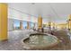 Indoor hot tub with a lounge area and tile flooring at 2000 Ocean Blvd. N # Ph12, Myrtle Beach, SC 29577