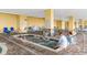 Indoor hot tub area with lounge chairs and tile flooring at 2000 Ocean Blvd. N # Ph12, Myrtle Beach, SC 29577