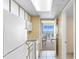 Efficient kitchen with white appliances and cabinets flowing into the living area with ocean views at 2000 Ocean Blvd. N # Ph12, Myrtle Beach, SC 29577