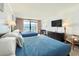 Bright hotel room with two beds, a dresser, a TV, and a balcony overlooking the ocean at 201 74Th Ave. N # 2638, Myrtle Beach, SC 29572