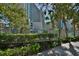 View of the exterior of a modern high-rise building with balconies and lush landscaping around the property at 201 74Th Ave. N # 2638, Myrtle Beach, SC 29572