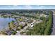 Panoramic aerial view of the property and the surrounding community near a picturesque lake at 205 Carriage Lake Dr., Little River, SC 29566