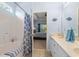 Bathroom with shower and tub combo and ensuite access to the main bedroom at 205 Carriage Lake Dr., Little River, SC 29566