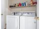 Laundry area with side by side washer and dryer at 205 Carriage Lake Dr., Little River, SC 29566