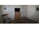 This bedroom features neutral walls, bed, ceiling fan, and storage options at 2090 Cross Gate Blvd # 301, Myrtle Beach, SC 29575