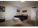 Cozy bedroom with neutral carpet, Hawkeye decor, and plenty of light at 2090 Cross Gate Blvd # 301, Myrtle Beach, SC 29575