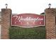 Maddington Place community sign with brick columns and manicured hedges at 2090 Cross Gate Blvd # 301, Myrtle Beach, SC 29575