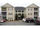 Attractive condo building with multiple units and well-maintained grounds in a convenient, accessible location at 2090 Cross Gate Blvd # 301, Myrtle Beach, SC 29575